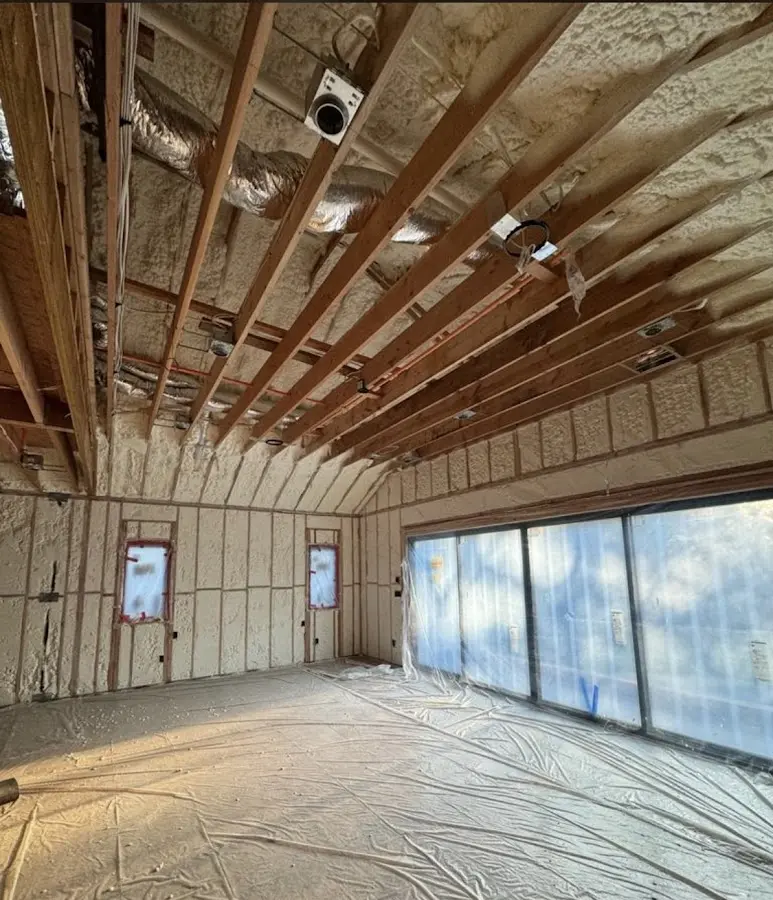 Interior walls and ceiling insulated with spray foam during new construction in Grand Junction