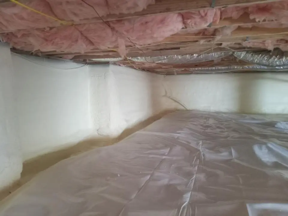 Crawl space encapsulation with closed-cell spray foam for Commercial Roof Restoration in Grand Junction